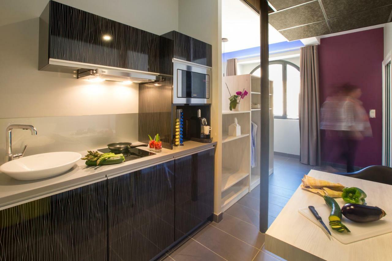 Appart'Hotel Les Fleurines By Urban Style Villefranche-de-Rouergue Exterior foto